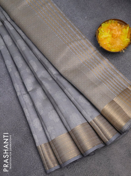 Semi raw silk saree grey with floral butta prints and zari woven border