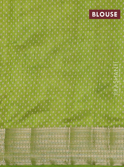 Semi raw silk saree light green with floral butta prints and zari woven border