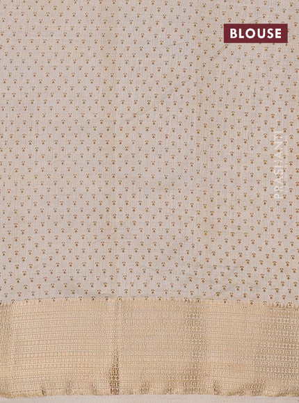 Semi raw silk saree cream with floral butta prints and zari woven border