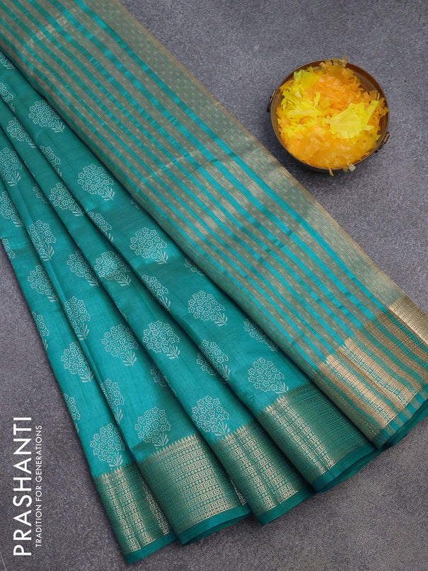 Semi raw silk saree teal blue with floral butta prints and zari woven border