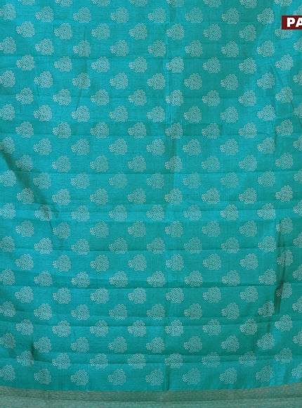 Semi raw silk saree teal blue with floral butta prints and zari woven border