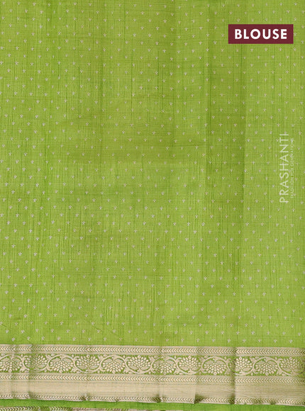 Semi raw silk saree light green with butta prints and zari woven border