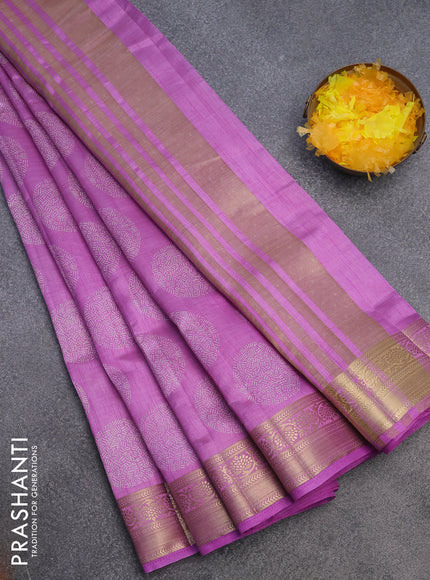 Semi raw silk saree lavender with butta prints and zari woven border