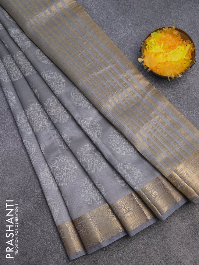 Semi raw silk saree grey with butta prints and zari woven border