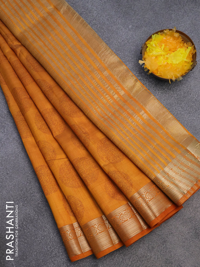 Semi raw silk saree dark mustard with butta prints and zari woven border