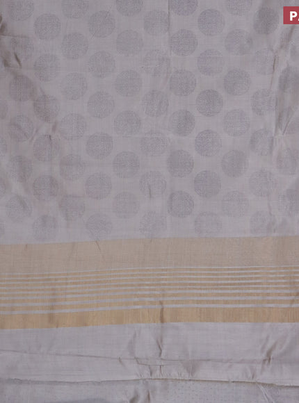 Semi raw silk saree pastel grey with butta prints and zari woven border