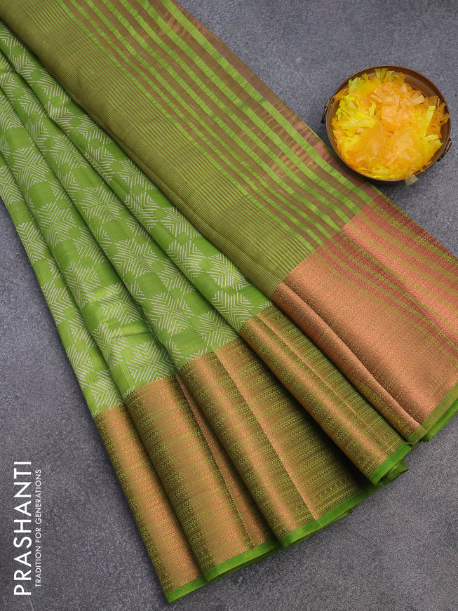 Semi raw silk saree light green with allover butta prints and long copper zari woven border