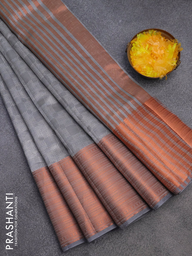 Semi raw silk saree grey with allover butta prints and long copper zari woven border