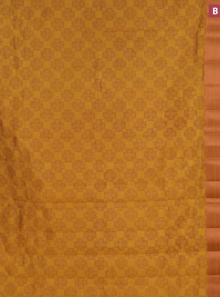 Semi raw silk saree mustard yellow with allover butta prints and long copper zari woven border