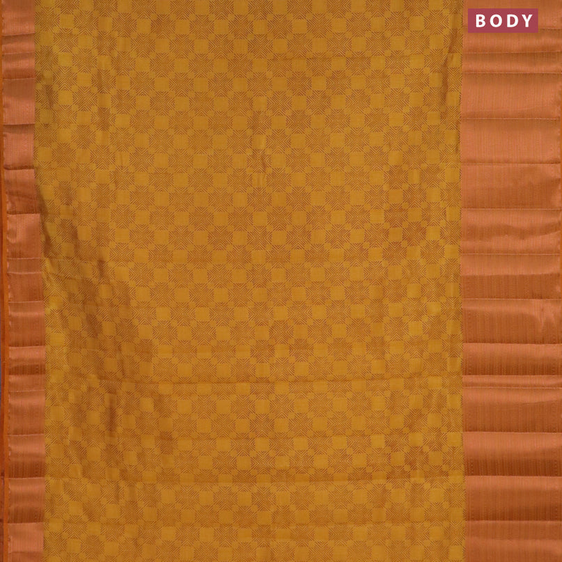 Semi raw silk saree mustard yellow with allover butta prints and long copper zari woven border