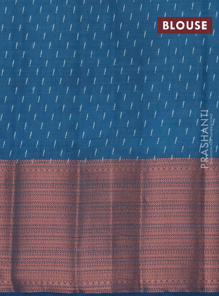 Semi raw silk saree cs blue with allover butta prints and long copper zari woven border