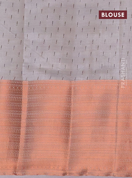 Semi raw silk saree pastel grey with allover butta prints and long copper zari woven border