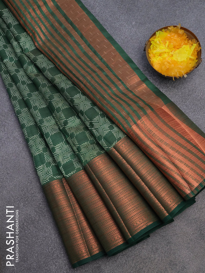 Semi raw silk saree bottle green with allover butta prints and long copper zari woven border