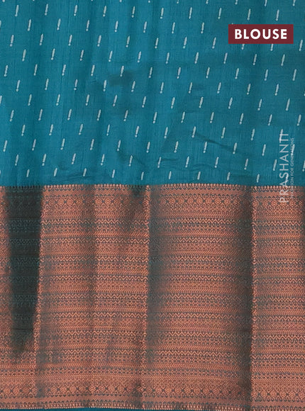 Semi raw silk saree teal green shade with allover butta prints and long copper zari woven border