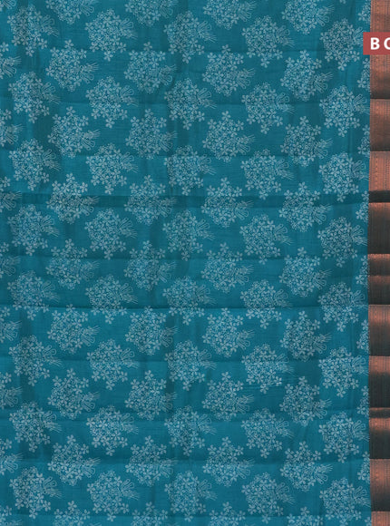 Semi raw silk saree teal green shade with allover floral butta prints and long copper zari woven border