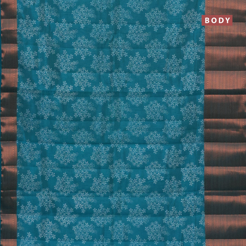 Semi raw silk saree teal green shade with allover floral butta prints and long copper zari woven border