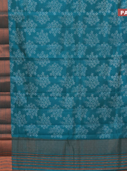 Semi raw silk saree teal green shade with allover floral butta prints and long copper zari woven border