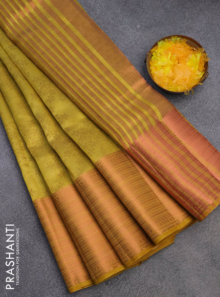 Semi raw silk saree yellow with allover floral butta prints and long copper zari woven border