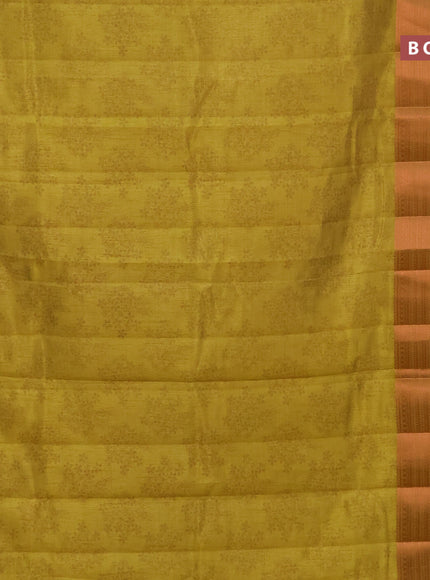 Semi raw silk saree yellow with allover floral butta prints and long copper zari woven border