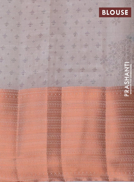 Semi raw silk saree pastel grey with allover floral butta prints and long copper zari woven border