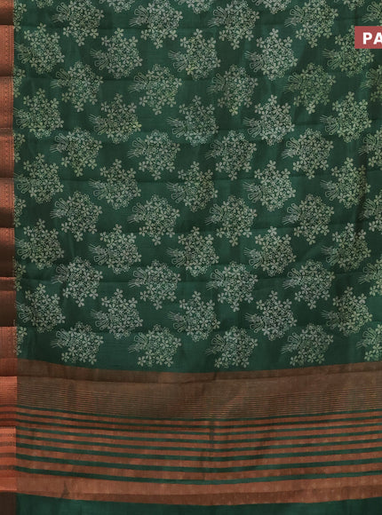 Semi raw silk saree bottle green with allover floral butta prints and long copper zari woven border