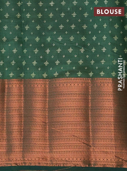 Semi raw silk saree bottle green with allover floral butta prints and long copper zari woven border