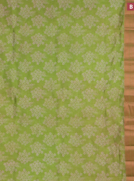 Semi raw silk saree light green with allover floral butta prints and long copper zari woven border