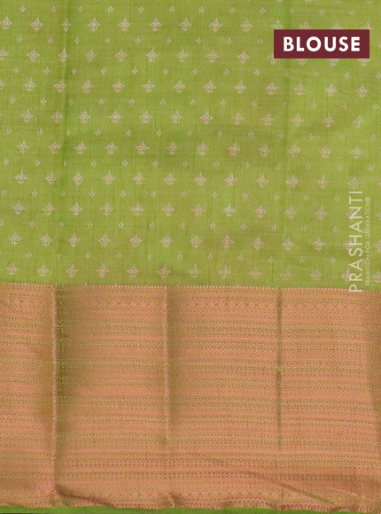 Semi raw silk saree light green with allover floral butta prints and long copper zari woven border