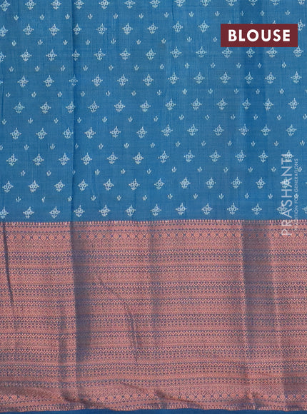 Semi raw silk saree cs blue with allover floral butta prints and long copper zari woven border