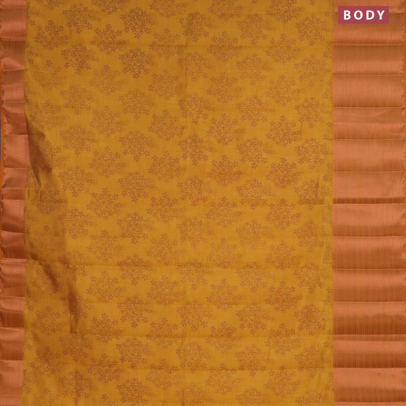 Semi raw silk saree mustard yellow with allover floral butta prints and long copper zari woven border