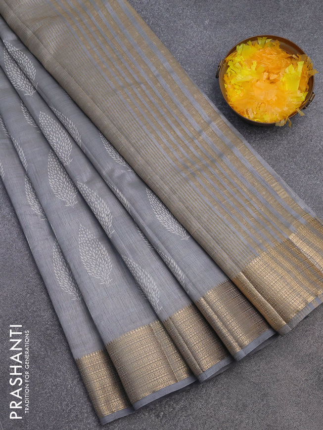 Semi raw silk saree grey with allover leaf prints and zari woven border