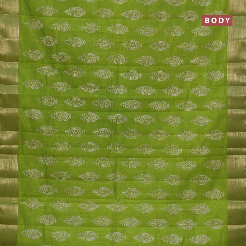 Semi raw silk saree light green with allover leaf prints and zari woven border