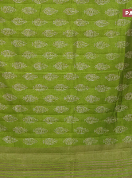 Semi raw silk saree light green with allover leaf prints and zari woven border