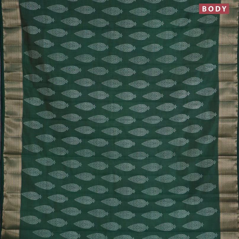 Semi raw silk saree bottle green with allover leaf prints and zari woven border