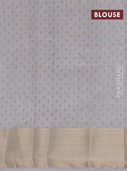 Semi raw silk saree pastel grey with allover leaf prints and zari woven border