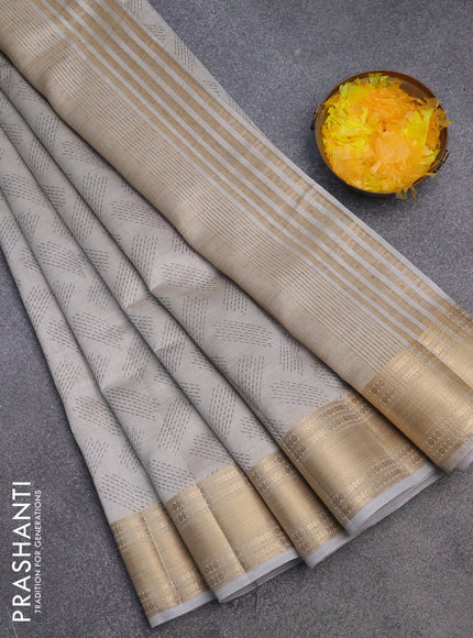 Semi raw silk saree pastel grey with butta prints and zari woven border