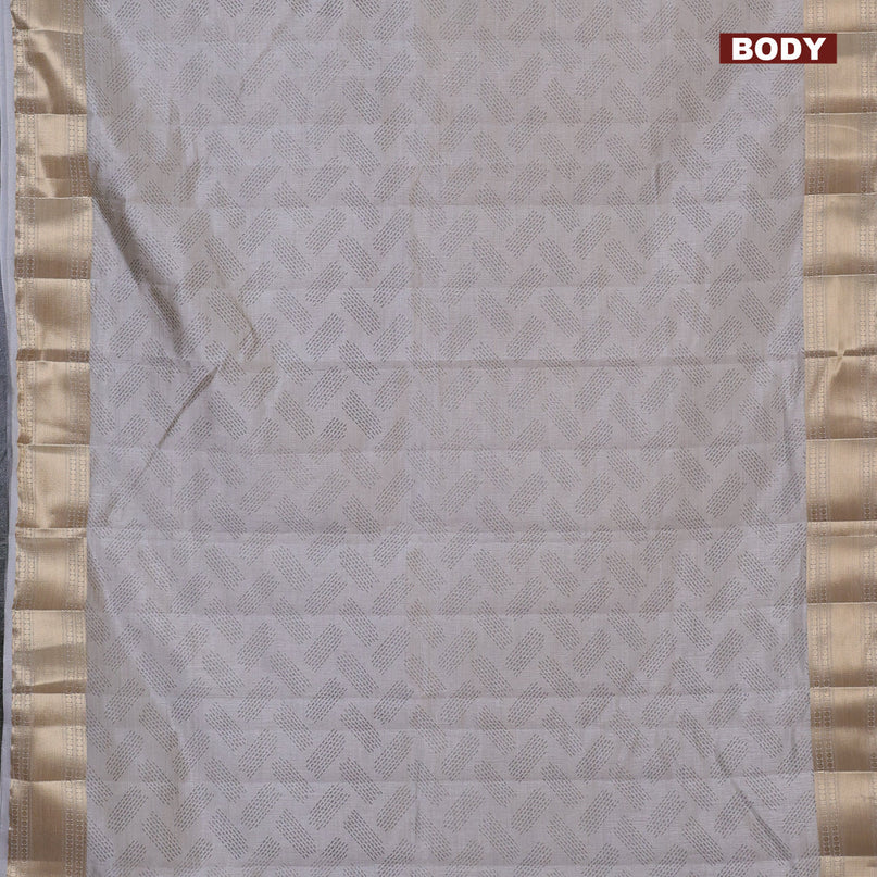 Semi raw silk saree pastel grey with butta prints and zari woven border