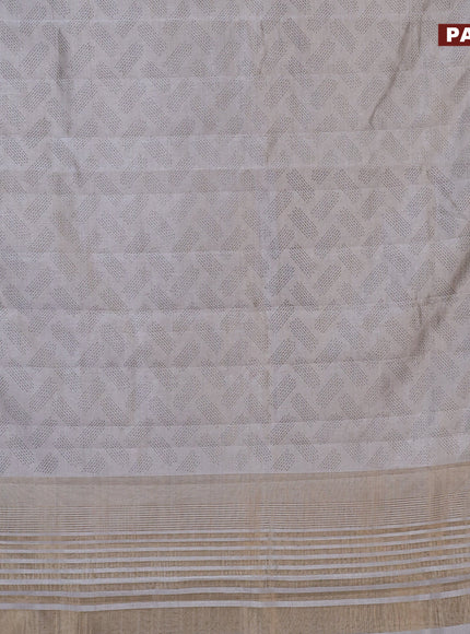 Semi raw silk saree pastel grey with butta prints and zari woven border