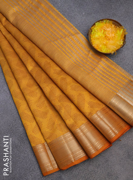 Semi raw silk saree dark mustard with butta prints and zari woven border