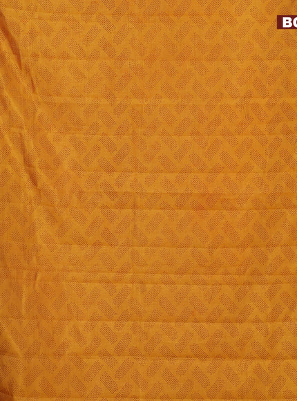 Semi raw silk saree dark mustard with butta prints and zari woven border