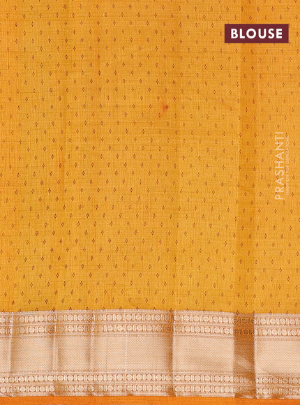 Semi raw silk saree dark mustard with butta prints and zari woven border