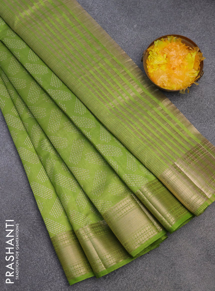 Semi raw silk saree light green with butta prints and zari woven border