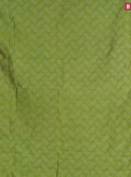 Semi raw silk saree light green with butta prints and zari woven border