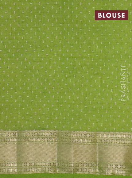 Semi raw silk saree light green with butta prints and zari woven border