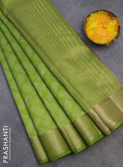 Semi raw silk saree light green with allover butta prints and zari woven border