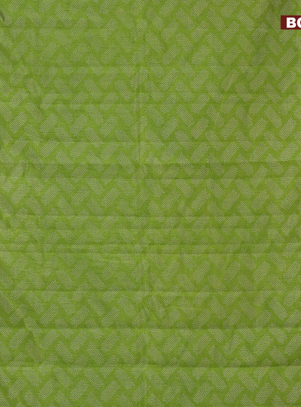 Semi raw silk saree light green with allover butta prints and zari woven border