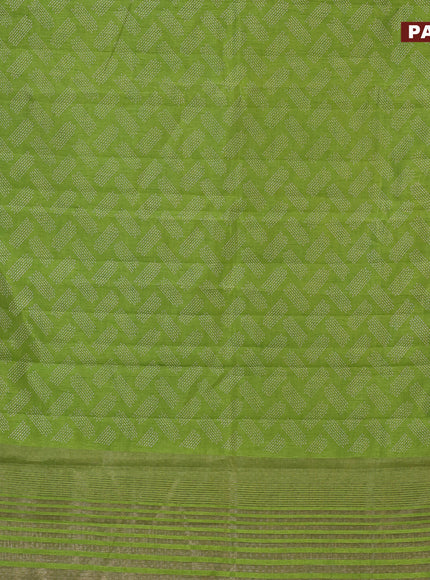 Semi raw silk saree light green with allover butta prints and zari woven border