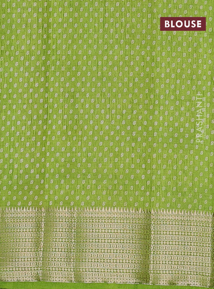 Semi raw silk saree light green with allover butta prints and zari woven border