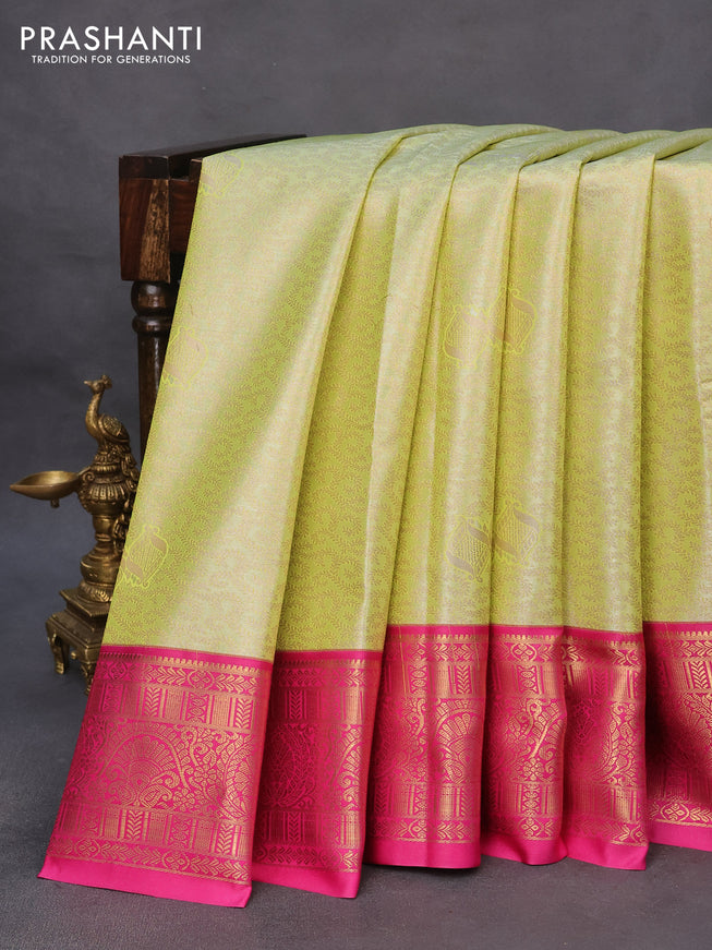 Tissue semi kanchipuram saree pista green and pink with allover zari woven brocade weaves and rich zari woven korvai border