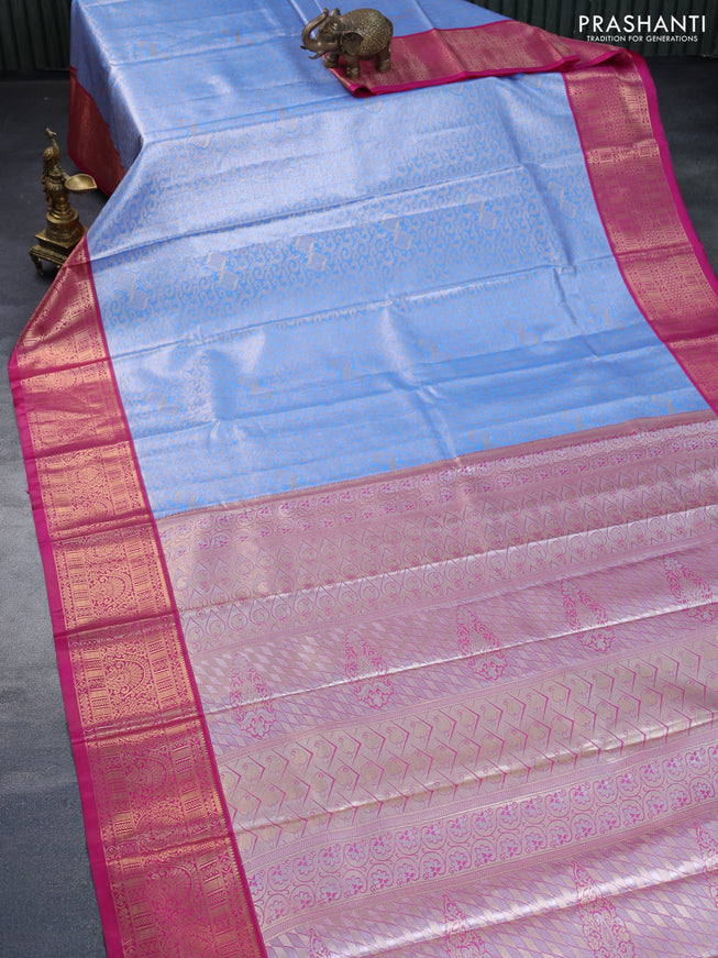 Tissue semi kanchipuram saree blue and pink with allover zari woven brocade weaves and rich zari woven korvai border